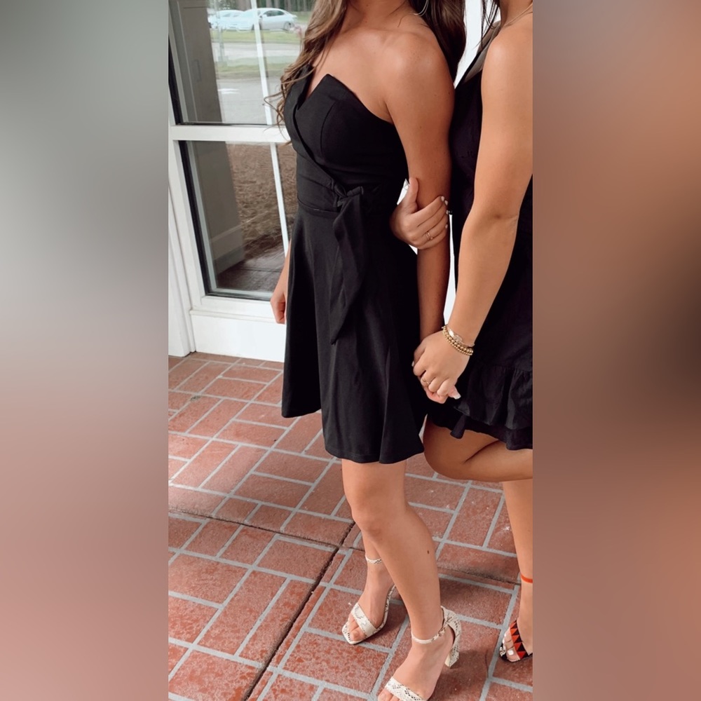 XXS but can fit a XS like a 0-2 dress ! Stretchy